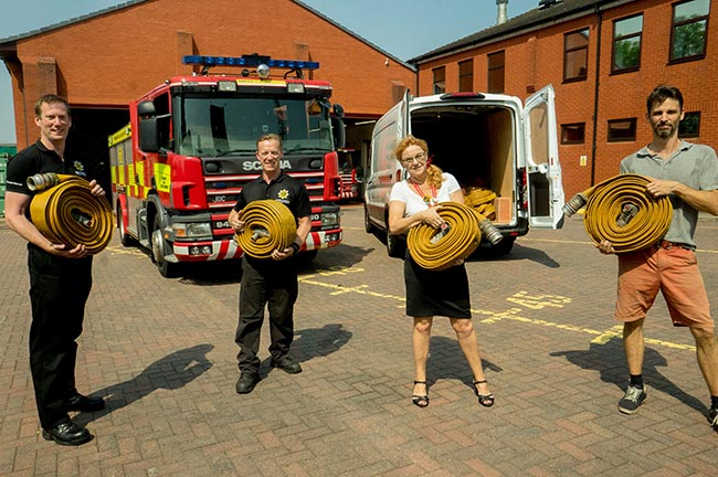 SFRS staff with used hose donations
