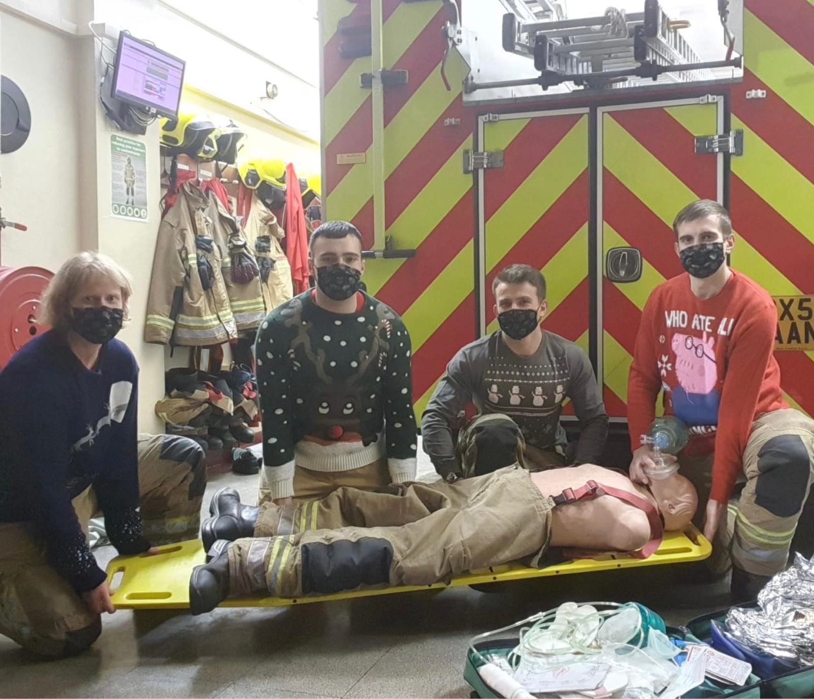 Retained firefighters in Christmas jumpers