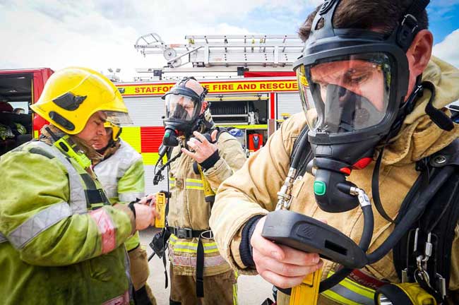 Firefighters in breathing apparatus