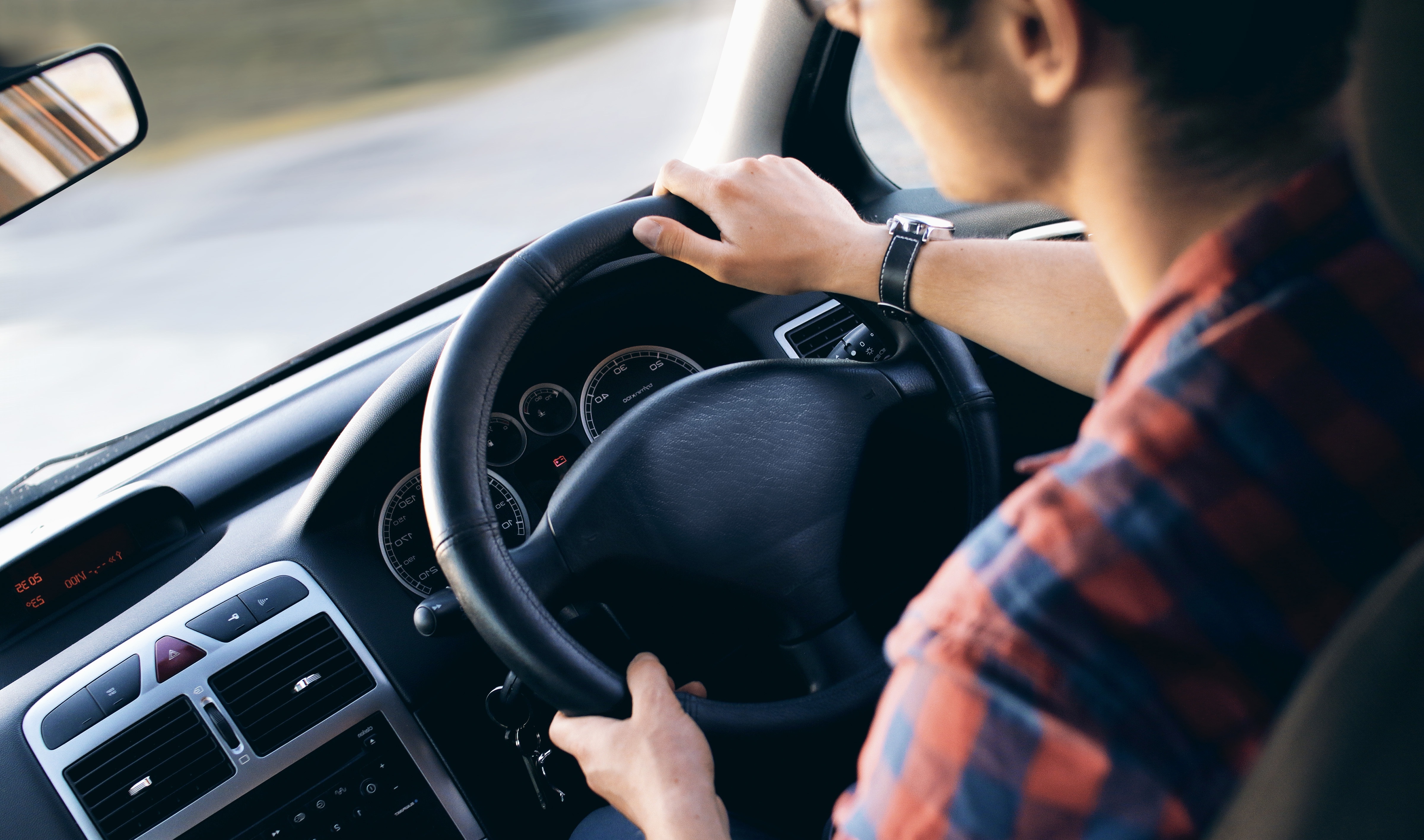 Man driving a car